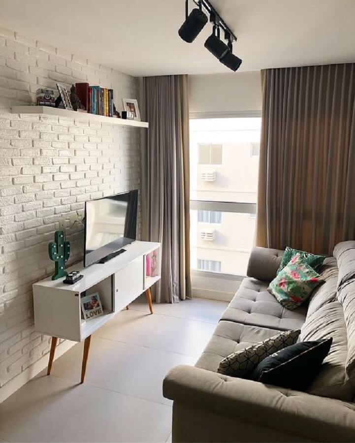 decoração simples para sala com rack retrô branco e sofá cinza decoração simples para sala com rack retrô branco e sofá cinza Foto Pinterest